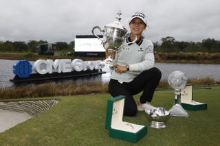 Golfer with trophy