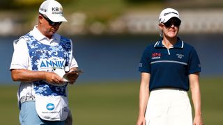 Two men golfing in sunny weather