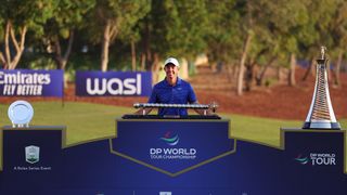 Golfer with trophy